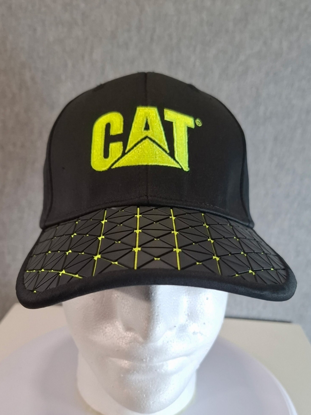 CAT Black Cap with Neon Yellow Logo and Patterned Visor